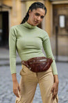 Style Odense i smukt mørkebrunt vintagelæder. Lækker, cool og rå unisex bumbag / bæltetaske i mellemstørrelse Octopus Denmark